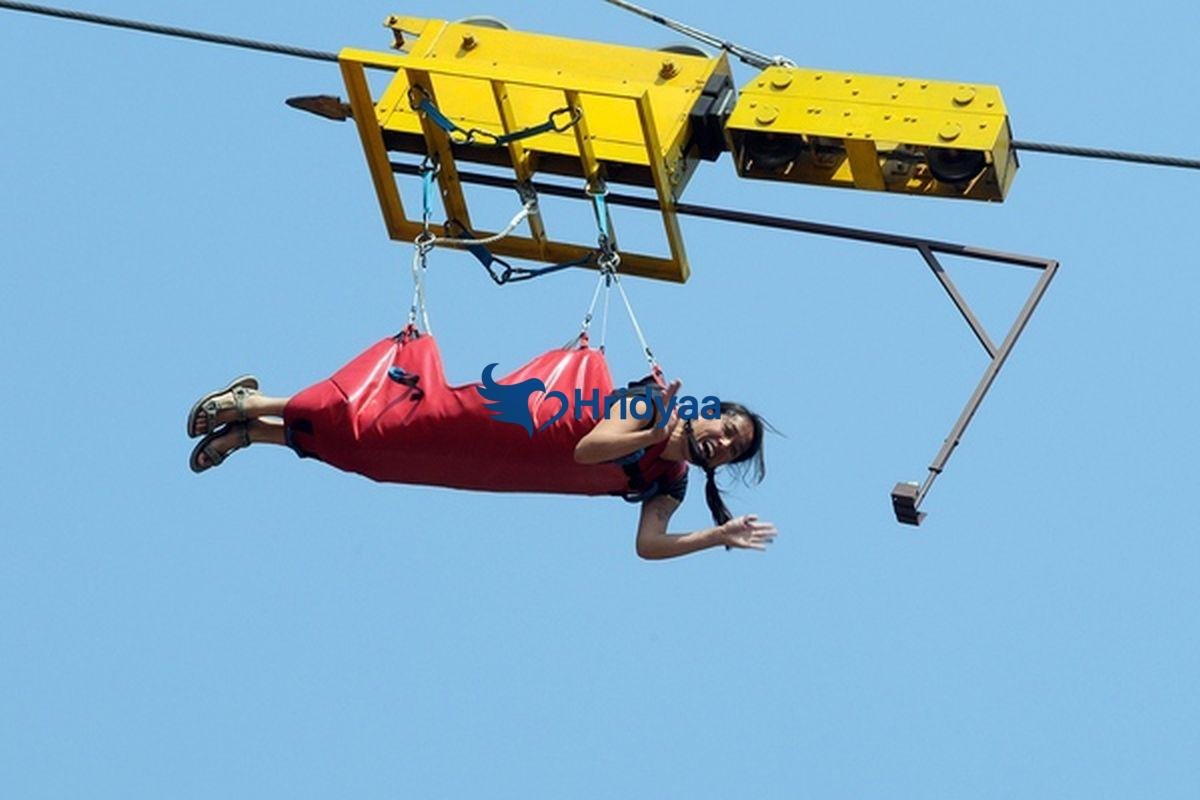 Flying Fox zipline in Rishikesh in horizontal Superman position across a valley