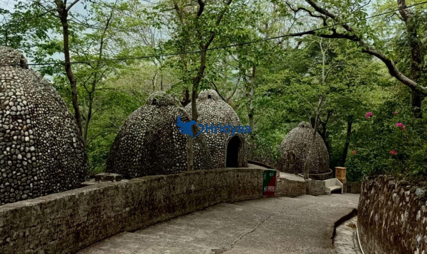 Beatles Ashram Rishikesh with graffiti art, meditation huts and peaceful forest surroundings