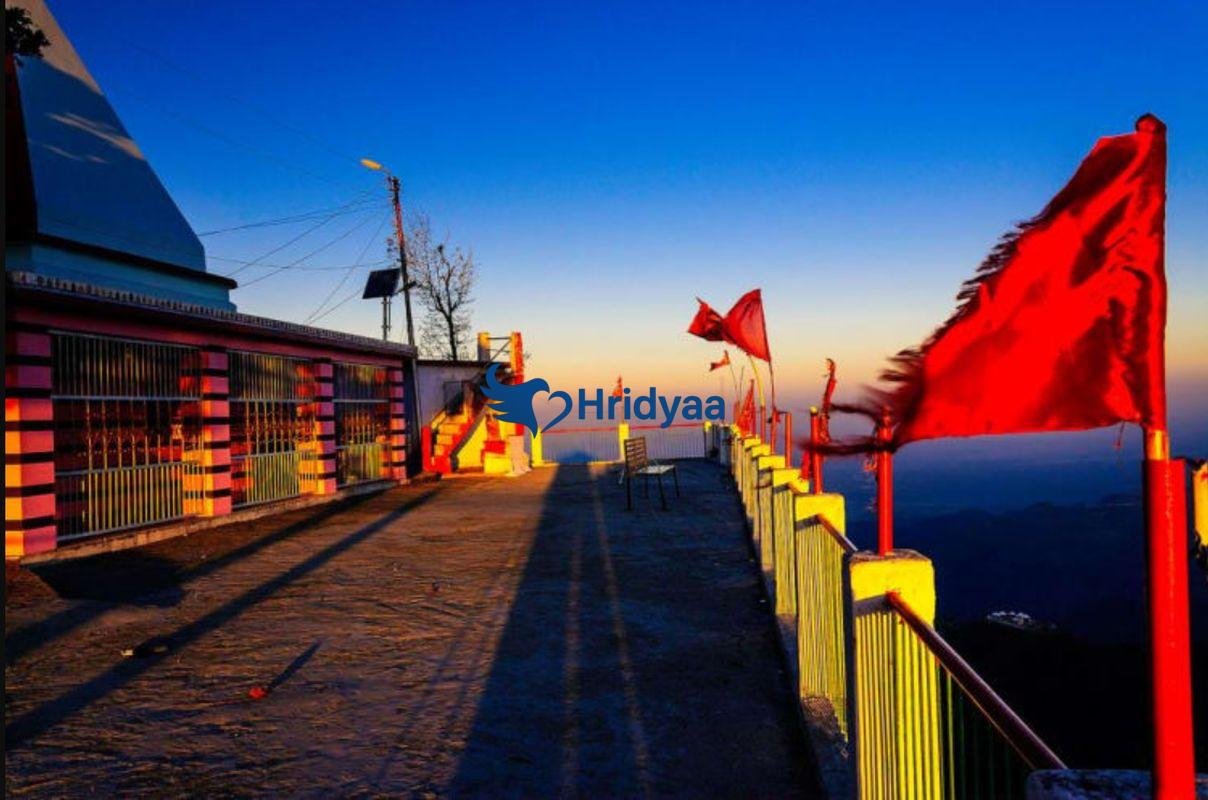 Kunjapuri Temple near Rishikesh overlooking forested hills and distant Himalayan views