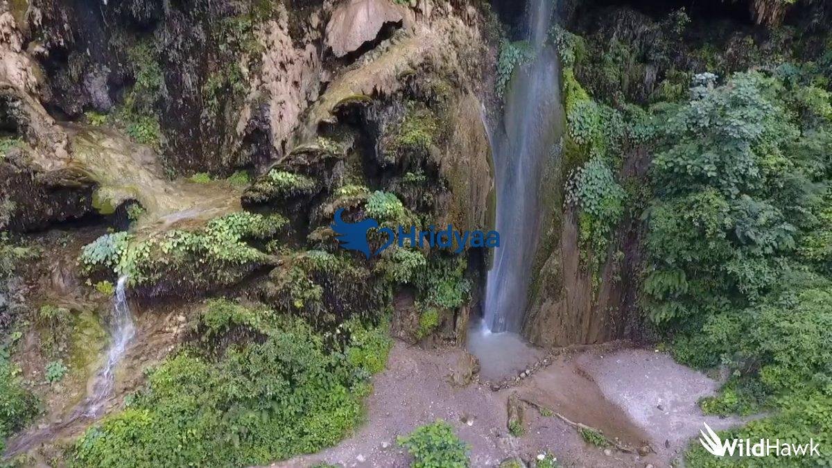 Phool Chatti Waterfall in Rishikesh with gentle cascades, forest trail and serene natural surroundings