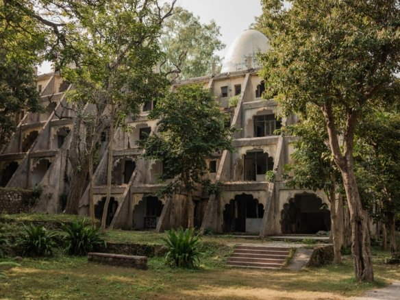 Beatles Ashram in Rishikesh with meditation domes and graffiti walls surrounded by forest