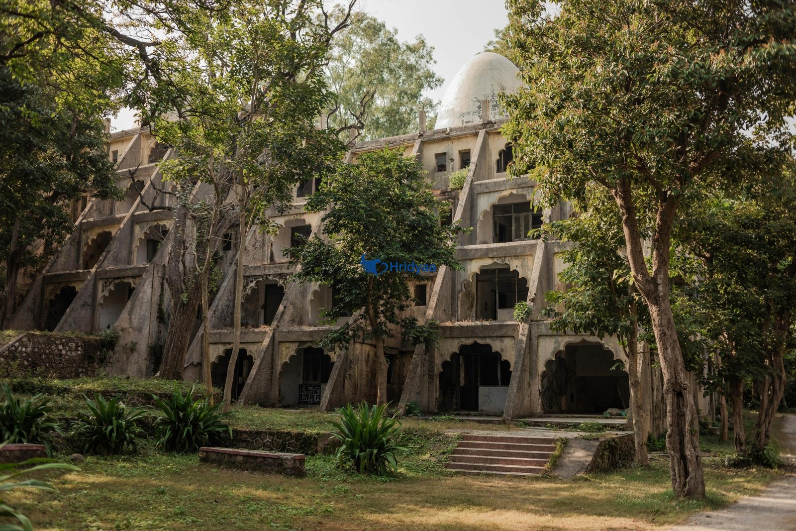Beatles Ashram in Rishikesh with meditation domes and graffiti walls surrounded by forest