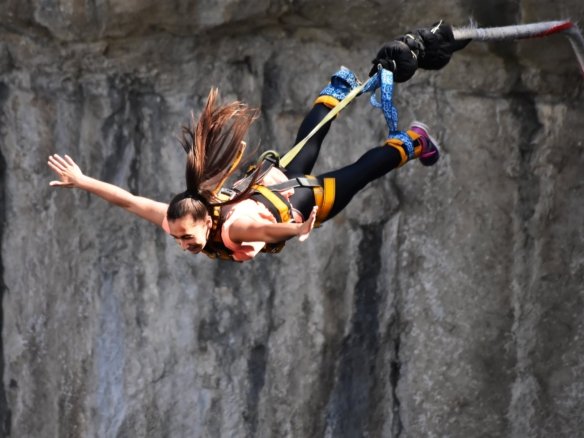 Adventure activities in Rishikesh featuring river rafting, bungee jumping, giant swing and flying fox over the Ganges valley